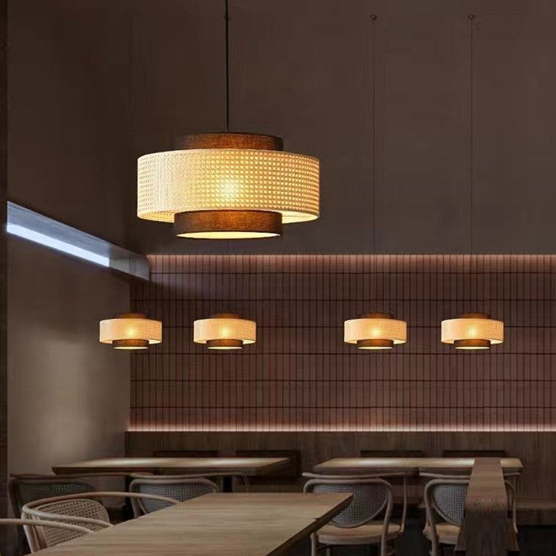 Nivara Black and Rattan Drum Pendant Light